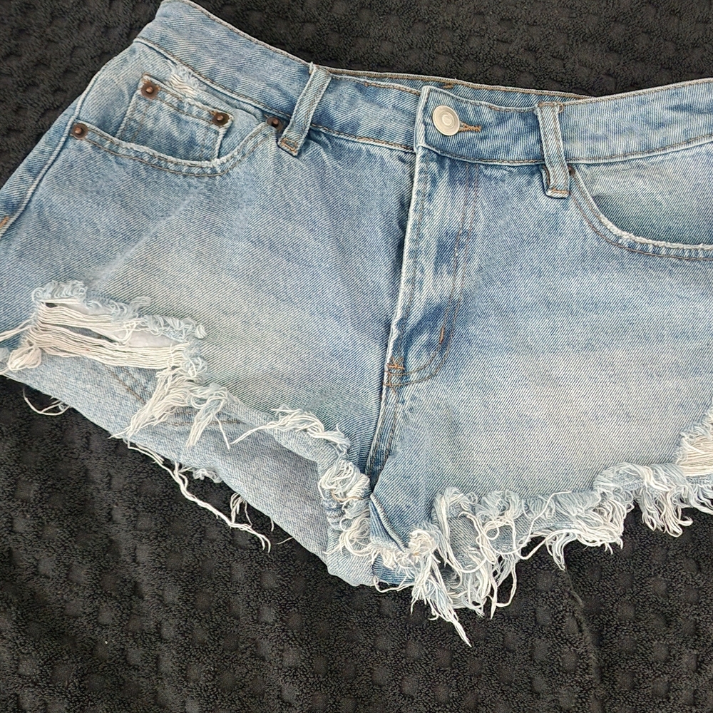 Blue Jean Shorts with Distressed Details and Frayed Hemlines